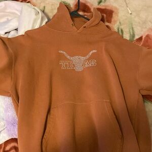 Orange hoodie, very comfortable and soft
